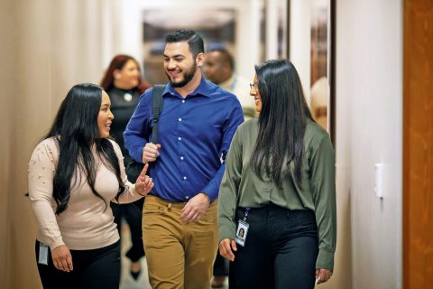 group of diverse coworkers walking